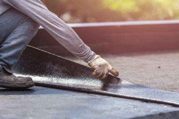 Professional Basement Waterproofing technician working in Morris, OK